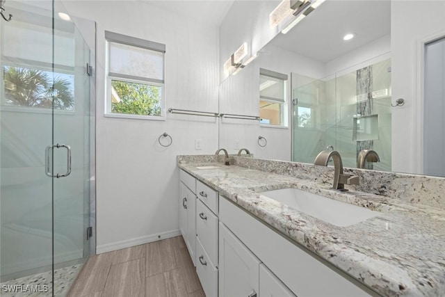 bathroom featuring vanity and walk in shower