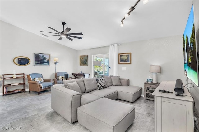 living room featuring ceiling fan, lofted ceiling, and rail lighting