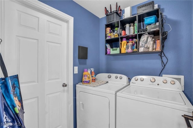 laundry area featuring washing machine and dryer