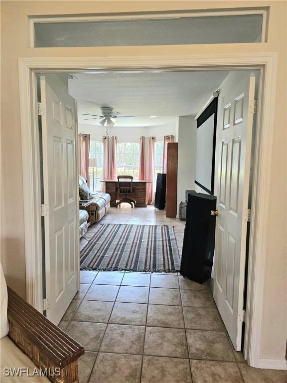 hall featuring tile patterned floors