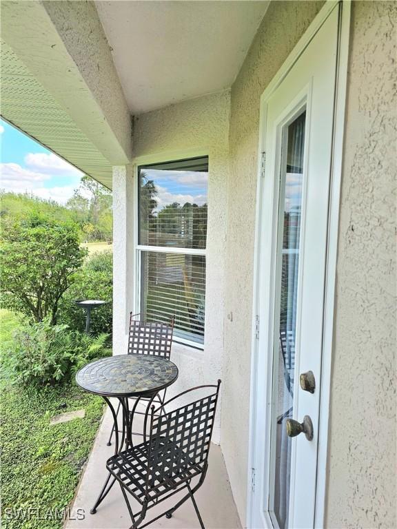 balcony featuring french doors