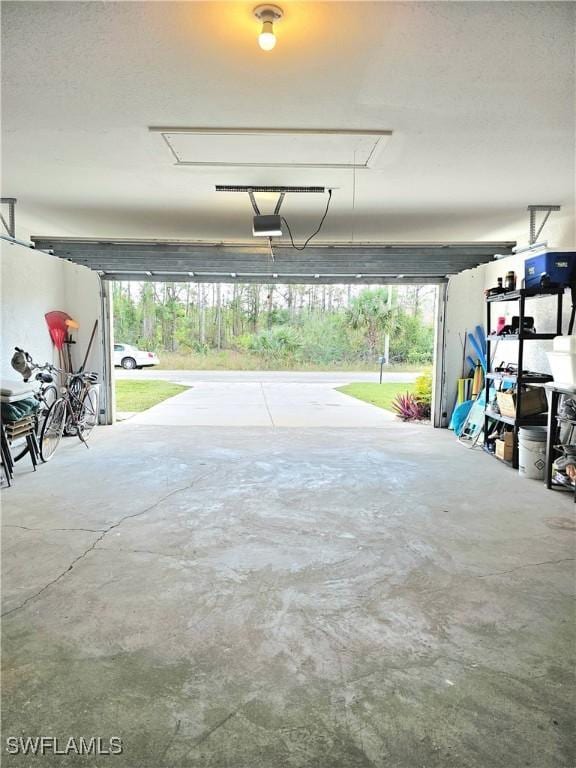 garage featuring a garage door opener