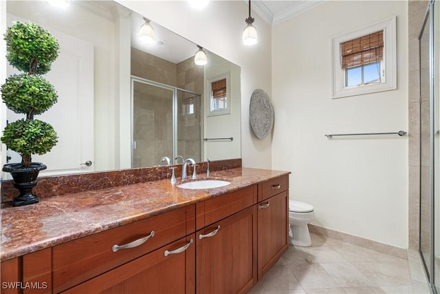 bathroom featuring a shower with shower door, ornamental molding, vanity, toilet, and tile patterned floors