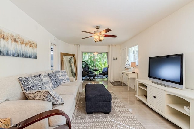 living room with a ceiling fan