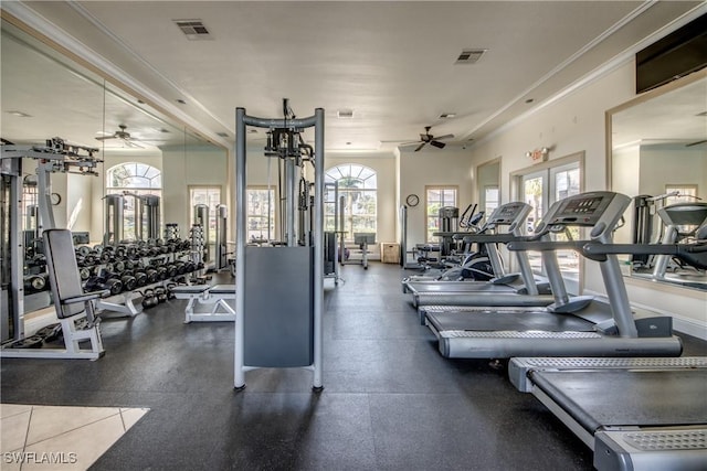 gym featuring ornamental molding, ceiling fan, and french doors