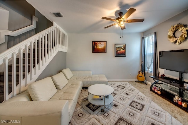 living room featuring ceiling fan