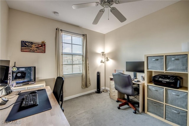 home office with ceiling fan and light colored carpet