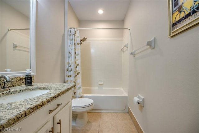 full bathroom featuring shower / tub combo with curtain, tile patterned floors, toilet, and vanity