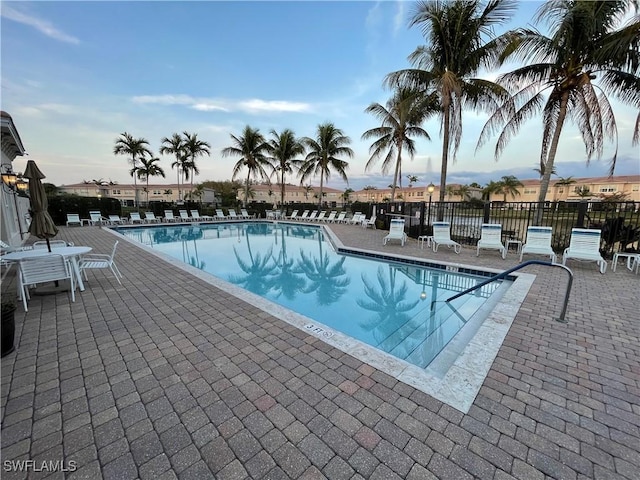 view of swimming pool with a patio area