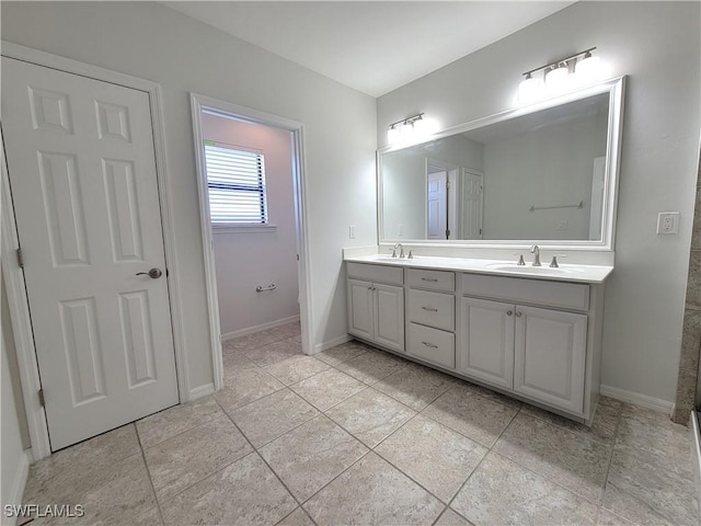 bathroom featuring vanity and tile patterned floors