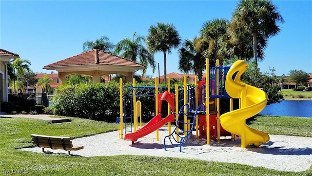 view of playground with a lawn