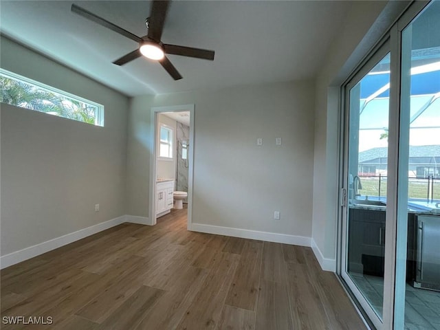 unfurnished room with light hardwood / wood-style floors and ceiling fan