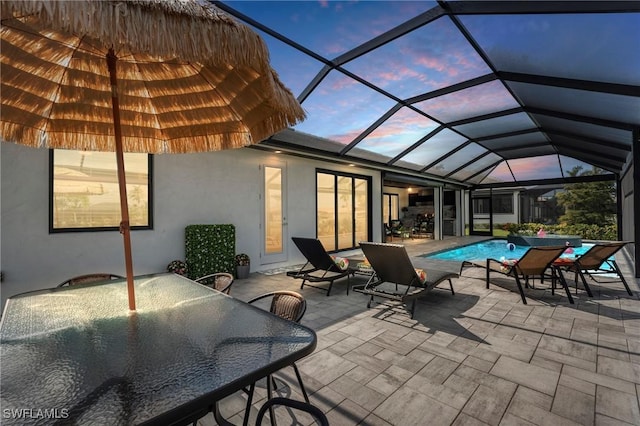 patio terrace at dusk with a lanai