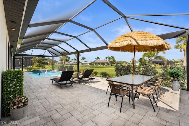 view of patio with a lanai