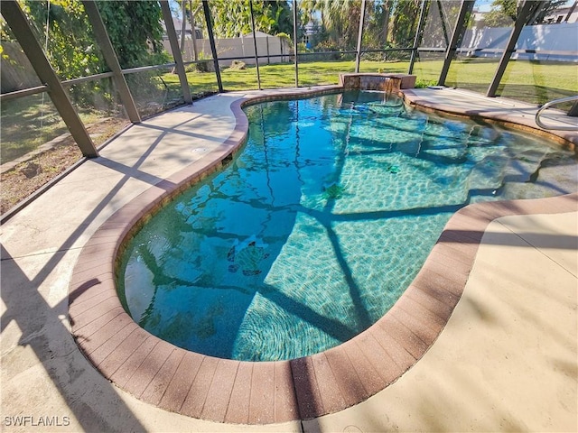 view of pool featuring a lanai, a lawn, and pool water feature