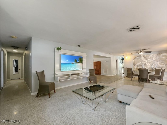 living room featuring ceiling fan