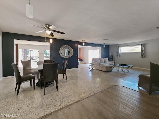 dining room featuring ceiling fan