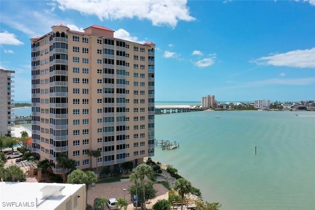 view of building exterior with a water view