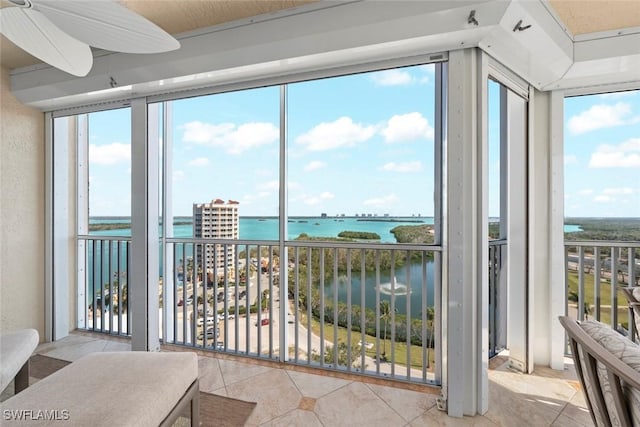 sunroom with a water view