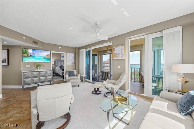 living room with ceiling fan