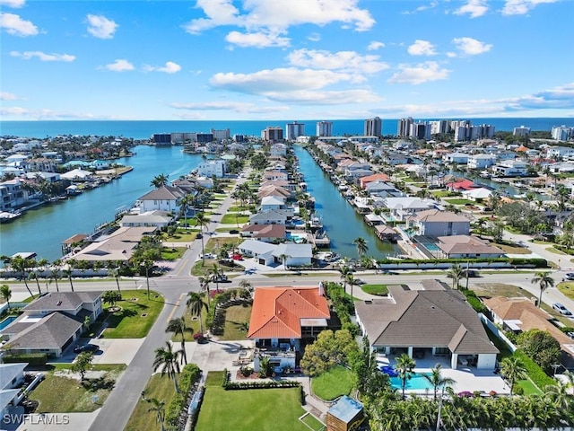 bird's eye view with a water view