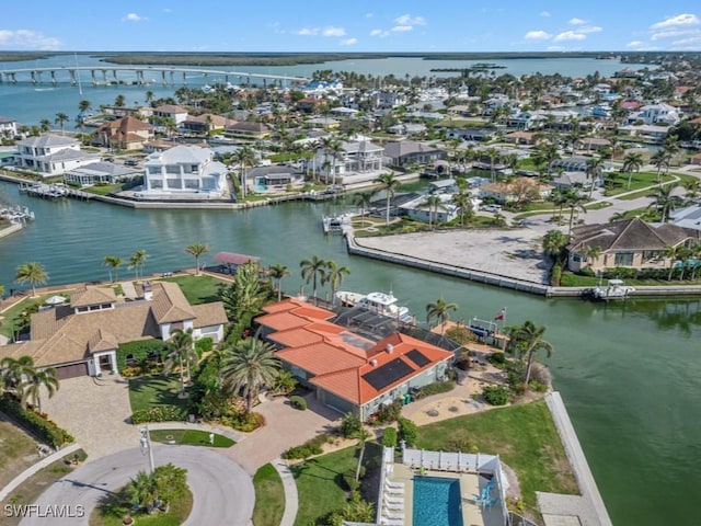 bird's eye view with a water view