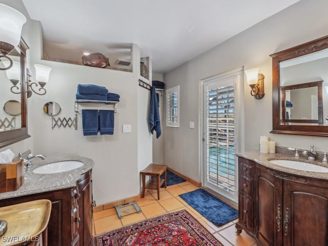 bathroom featuring tile patterned floors and vanity