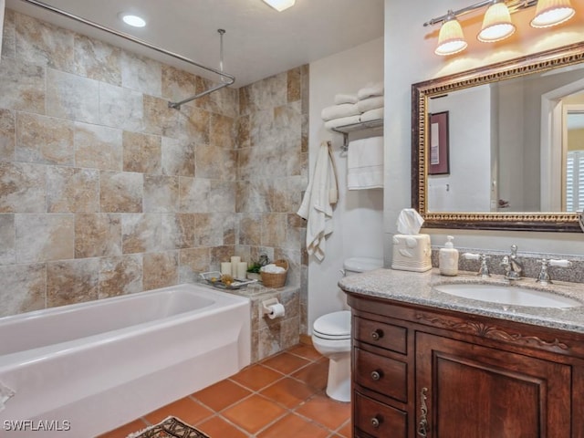 full bathroom featuring bathing tub / shower combination, vanity, tile patterned floors, and toilet