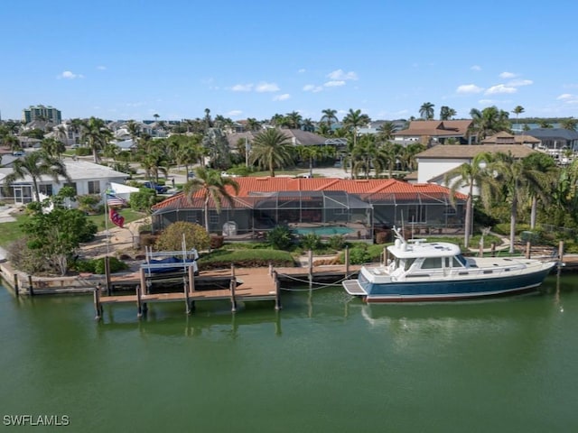 dock area with a water view and glass enclosure