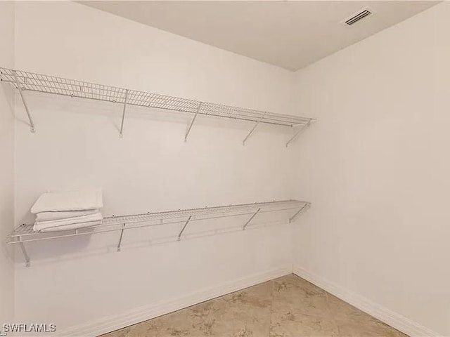 view of walk in closet