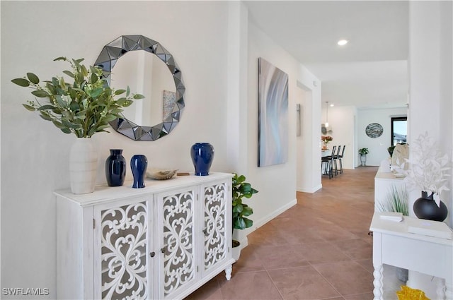 hall featuring tile patterned floors