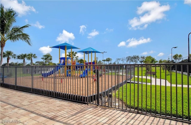 view of play area featuring a lawn