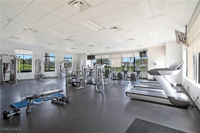 workout area with a drop ceiling