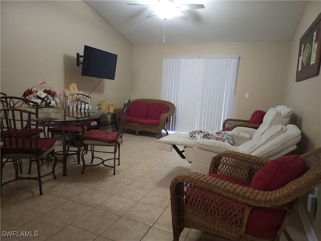 tiled living room featuring vaulted ceiling and ceiling fan