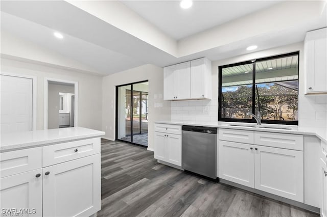 kitchen with white cabinetry, sink, dark wood-type flooring, and dishwasher