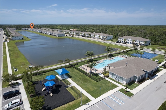 bird's eye view with a water view