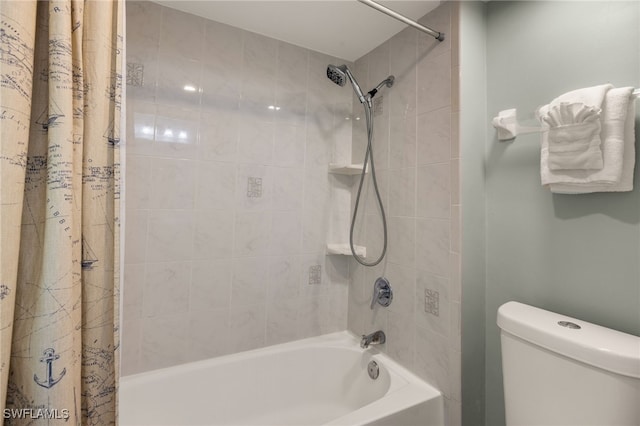 bathroom with toilet and shower / bath combo