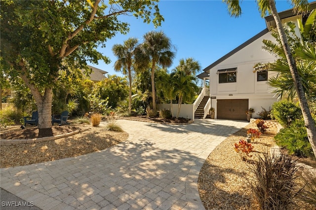 view of front of property with a garage