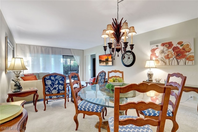 carpeted dining space with an inviting chandelier