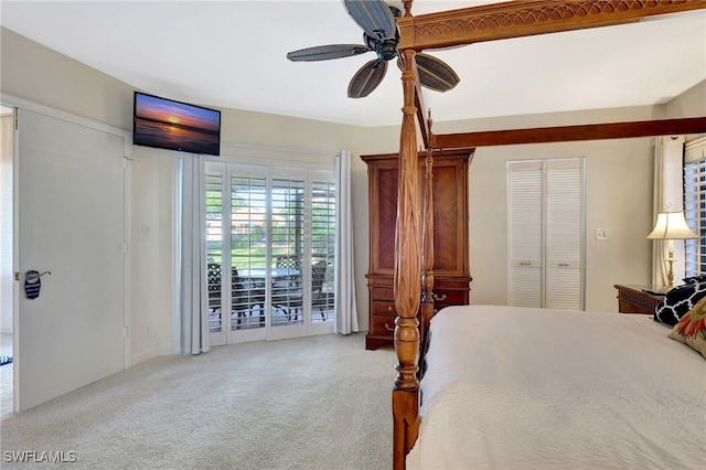 bedroom featuring access to outside, light colored carpet, and ceiling fan