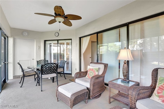 sunroom / solarium with ceiling fan