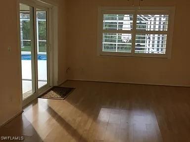 unfurnished dining area with hardwood / wood-style floors