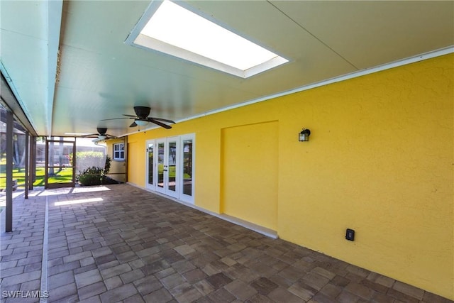 view of patio / terrace featuring french doors and ceiling fan