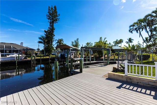 dock area with a water view