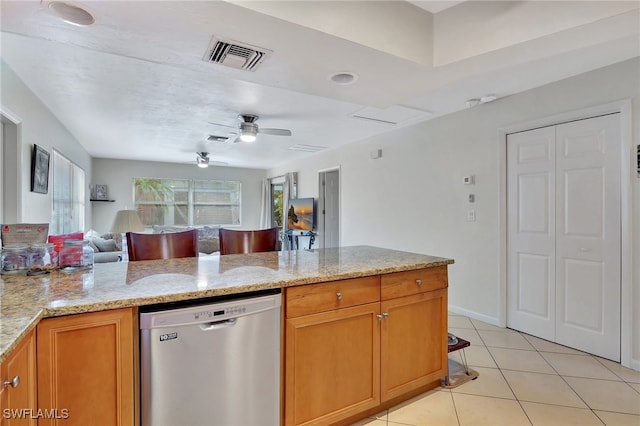 kitchen with light tile patterned floors, dishwasher, kitchen peninsula, ceiling fan, and light stone countertops