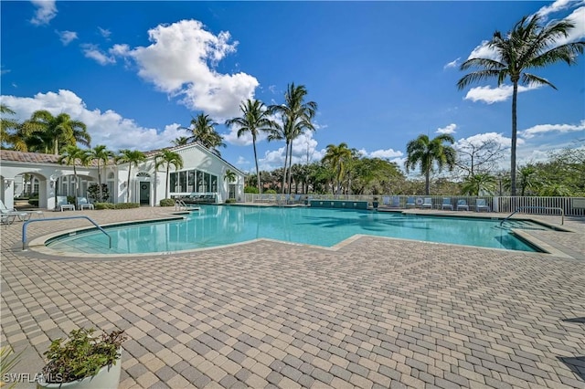20037 Serene Meadow Ln, Estero, FL 33928 - community pool featuring a patio area