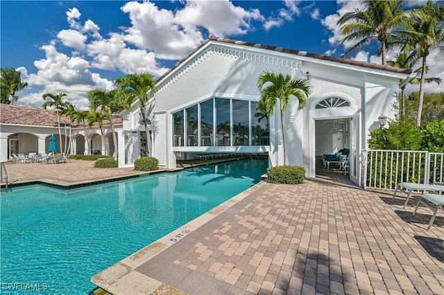 20037 Serene Meadow Ln, Estero, FL 33928 - community pool with a patio area