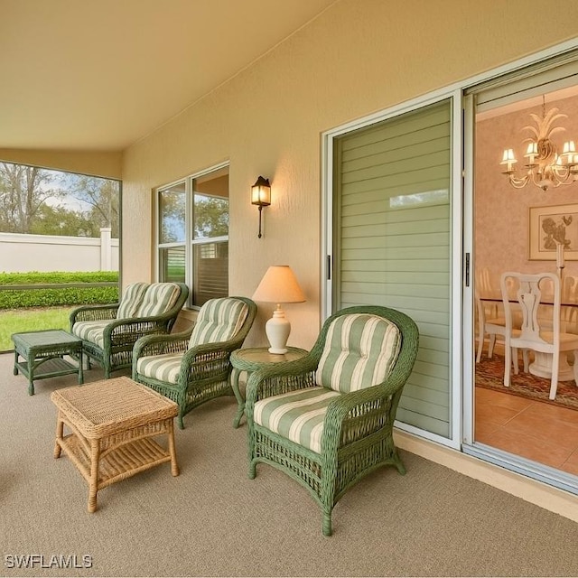 20037 Serene Meadow Ln, Estero, FL 33928 - sunroom with a chandelier