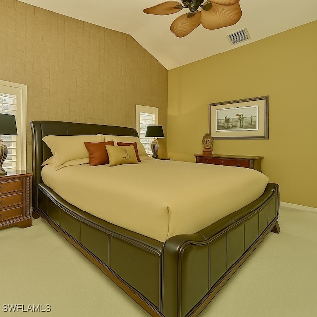 20037 Serene Meadow Ln, Estero, FL 33928 - bedroom featuring light colored carpet, vaulted ceiling, and a ceiling fan