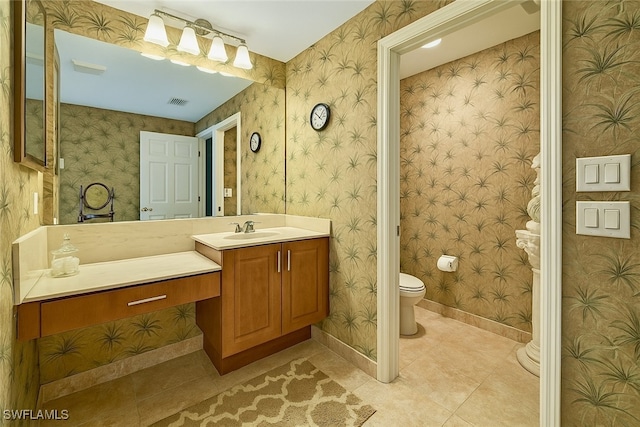 20037 Serene Meadow Ln, Estero, FL 33928 - bathroom featuring tile patterned flooring, vanity, and wallpapered walls